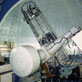 188cm反射望遠鏡と観測装置「新カセ分光器」(1990年撮影)